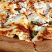 Photo of a pan pizza made by Nonno's
