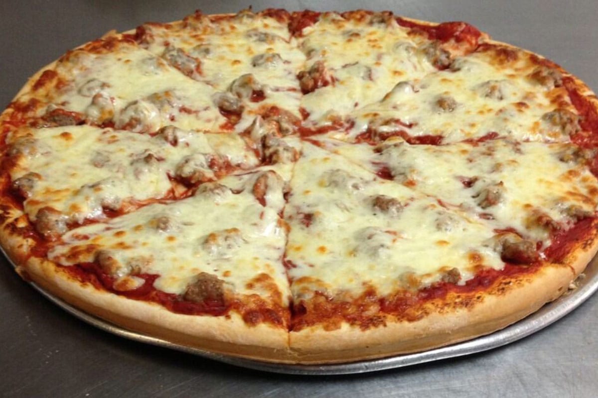 Photo of a thin pizza made by Nonno's pizza